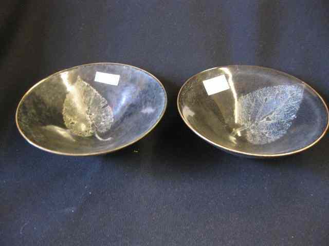 Appraisal: Pair of Jizhou kiln black bowls leaf decor '' diameter