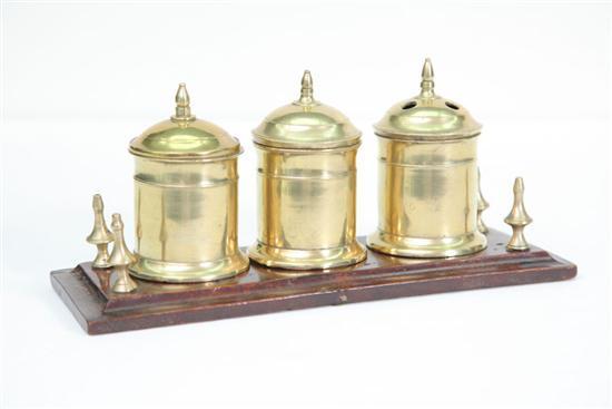 Appraisal: BRASS DESK SET Three lidded brass pieces including a sander