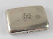 Appraisal: A silver hip pocket cigarette case Birmingham x cm wt