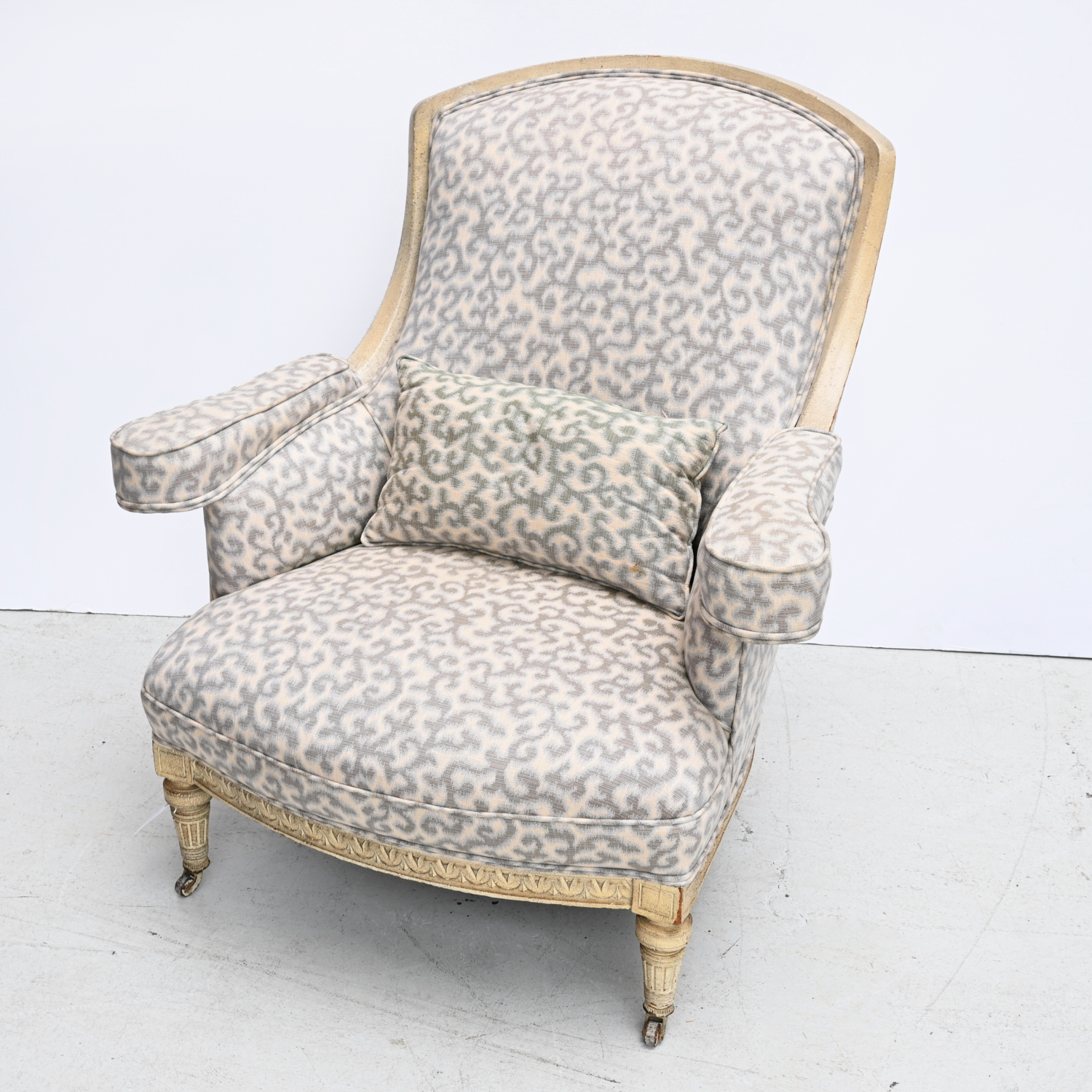 Appraisal: LOUIS XVI STYLE UPHOLSTERED BERGERE th c pebbled cream lacquered