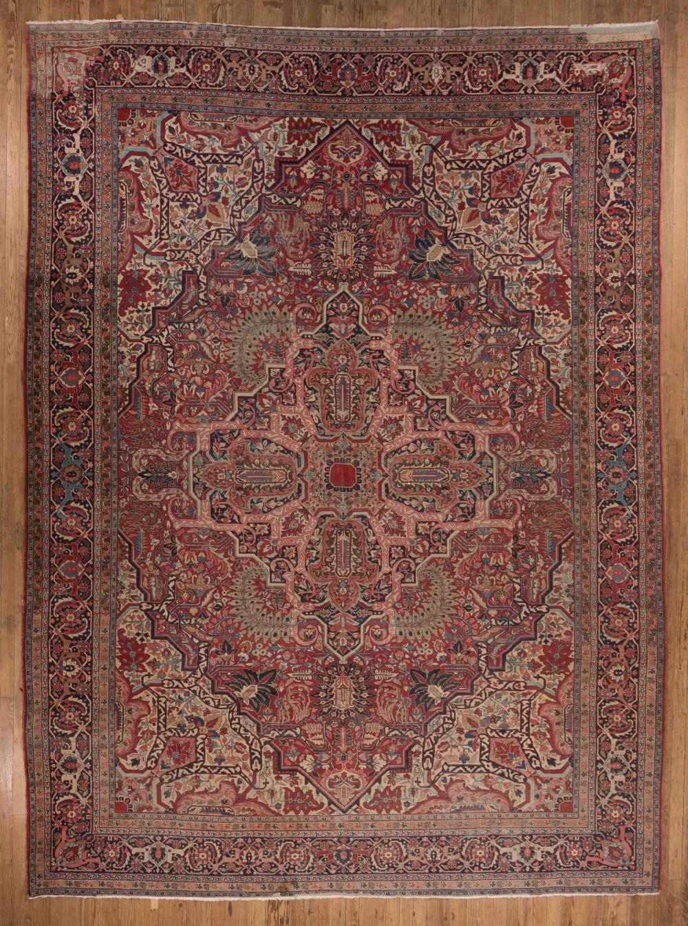 Appraisal: Antique Serapi Carpet red and pink ground blue border overall