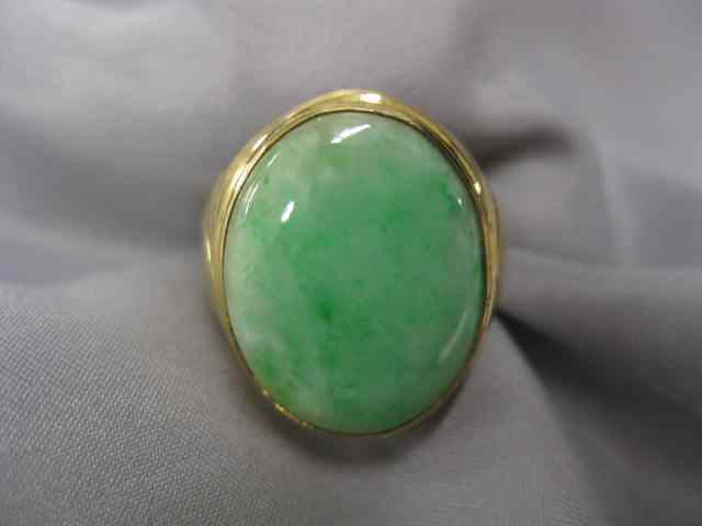 Appraisal: Jade Man's Ring fine apple green stonein k yellow gold