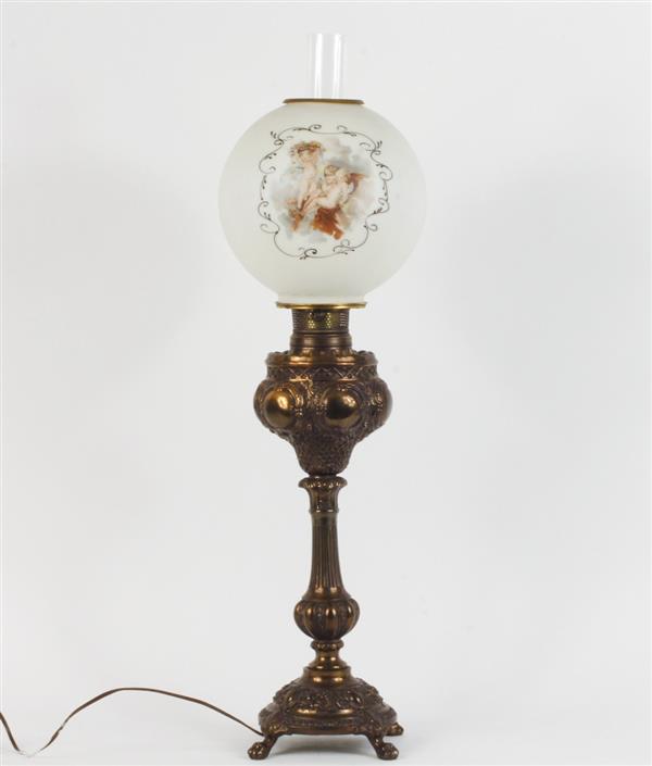 Appraisal: Brass banquet oil lamp with glass globe shade converted to