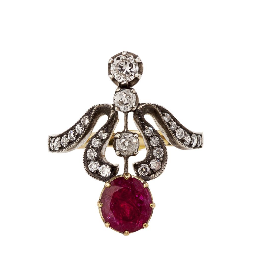 Appraisal: A Belle Epoque ruby and diamond set ring of scrolling