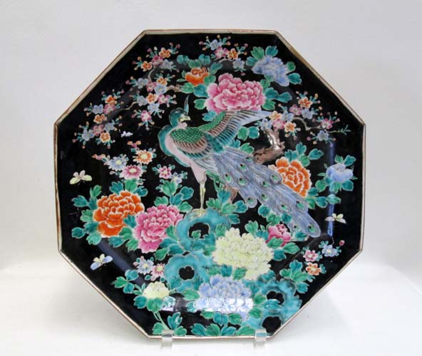 Appraisal: FAMILLE NOIRE PORCELAIN CHARGER WITH ENAMEL PEACOCK and floral motif