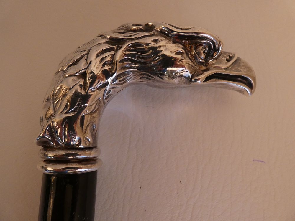 Appraisal: STERLING EAGLE HEAD SWORD CANE Sterling silver eagle head sword