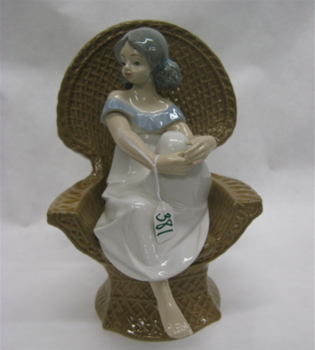 Appraisal: TANGRA GLAZED PORCELAIN FIGURE in the style of Lladro depicting