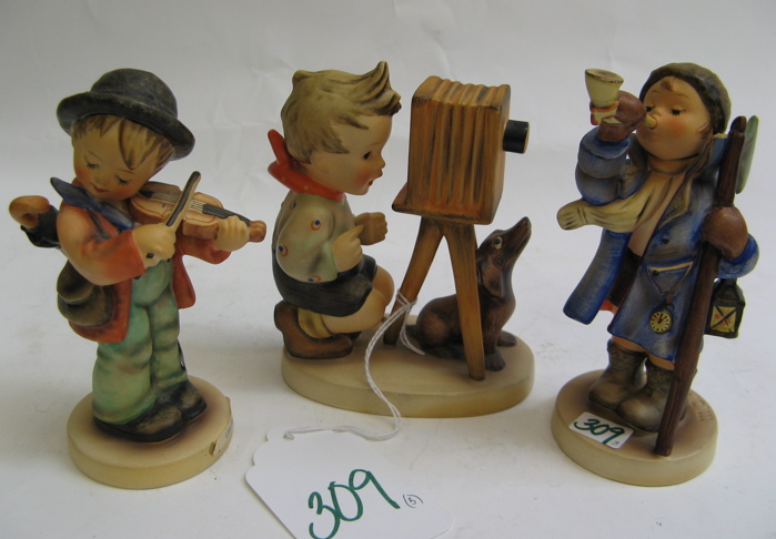 Appraisal: GERMAN HUMMEL FIGURES The Photographer HUM TM- H Hear Ye