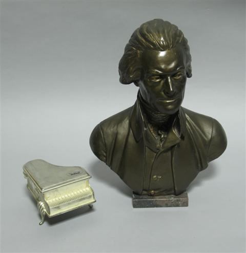 Appraisal: PORTRAIT BUST OF FRANZ LIZST Together with silverplated musical piano-form