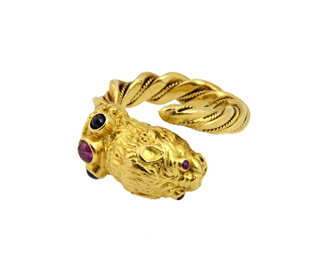 Appraisal: An ct yellow gold cabochon ruby and sapphire Lion ring