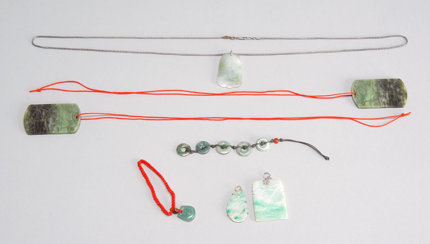 Appraisal: SEVEN PIECES OF JADE JEWELRY Includes five necklaces and two