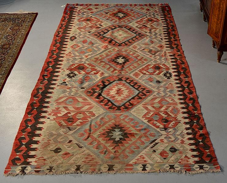 Appraisal: Kilim Carpet ' x ' Kilim carpet Overall geometric pattern