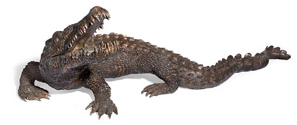 Appraisal: A patinated bronze figure of an alligator late th century