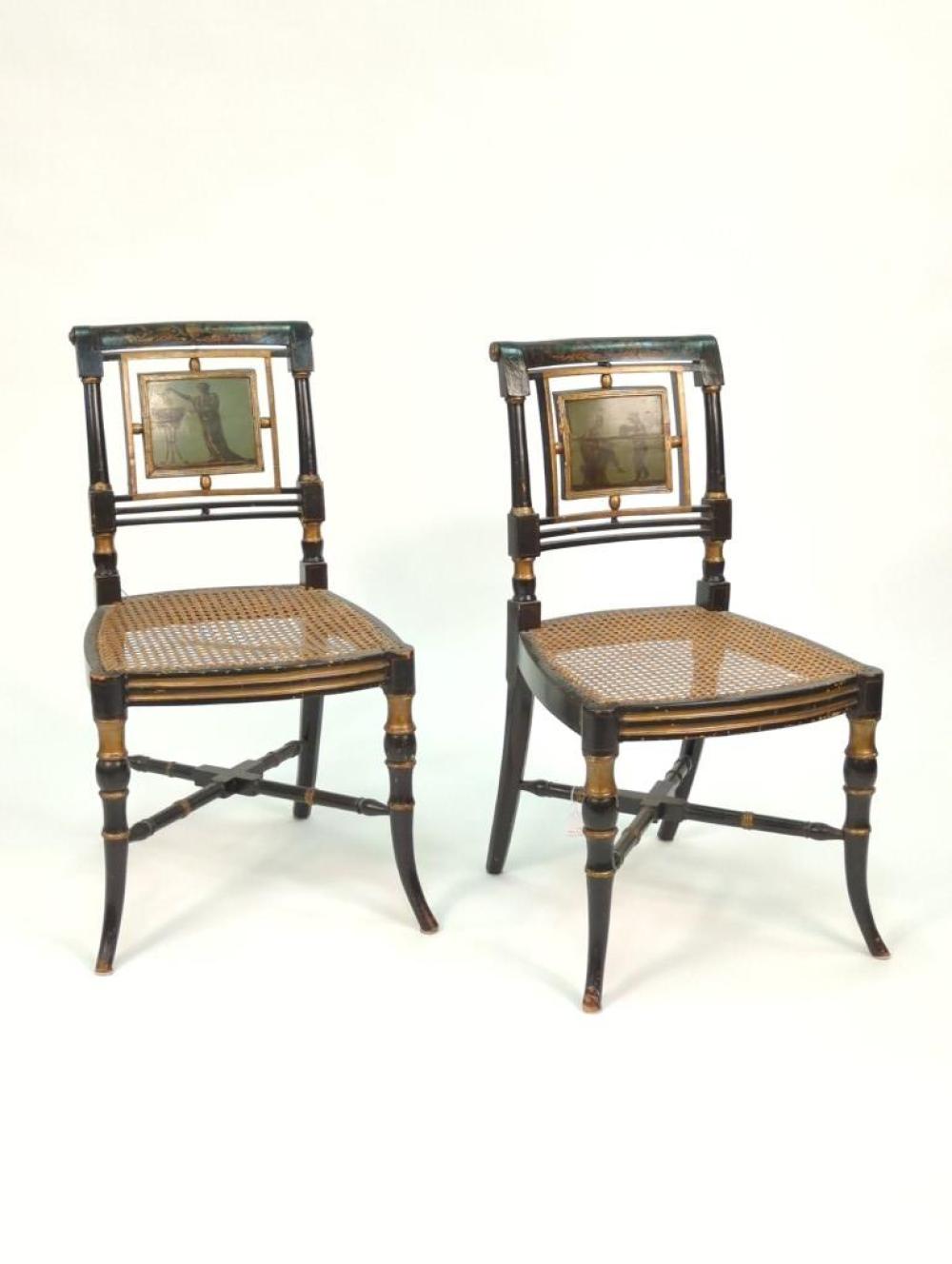 Appraisal: PAIR NEOCLASSICAL EBONIZED AND GILT CANED SEAT CHAIRS WITH HAND