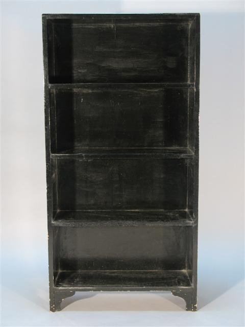 Appraisal: MODERN BLACK PAINTED BOOKSHELF Four shelves with sculpted skirt legs