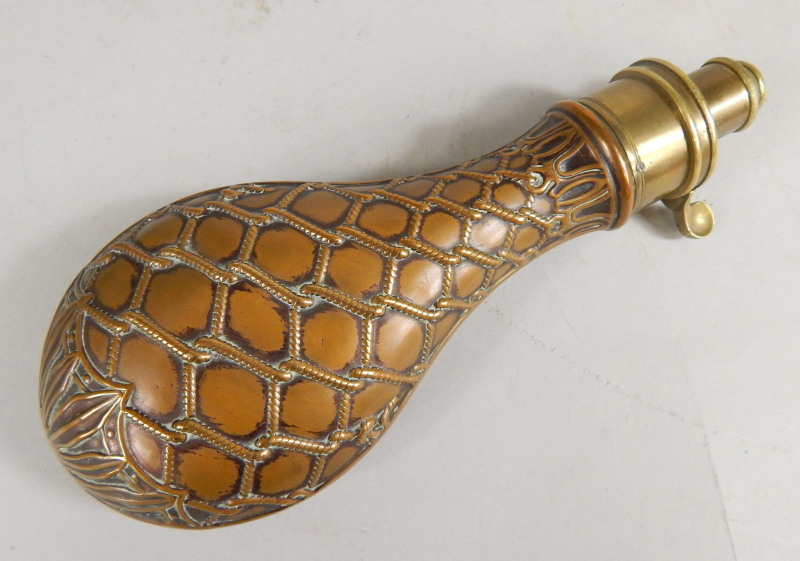 Appraisal: A copper and brass powder flask stamped DRAMS cm long