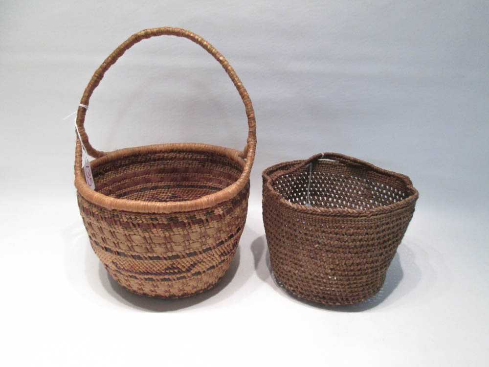 Appraisal: TWO NATIVE AMERICAN WASHINGTON COAST BASKETS WITH HANDLES the larger