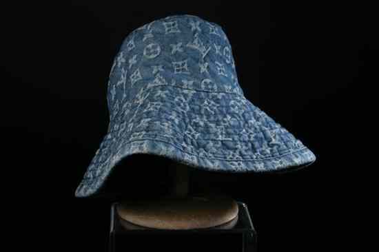 Appraisal: LOUIS VUITTON DENIM MONOGRAM HAT Size large Embroidered allover in