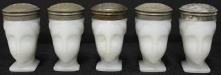 Appraisal: Opaline White Woman's Head Salt Shakers The stylized Art Deco