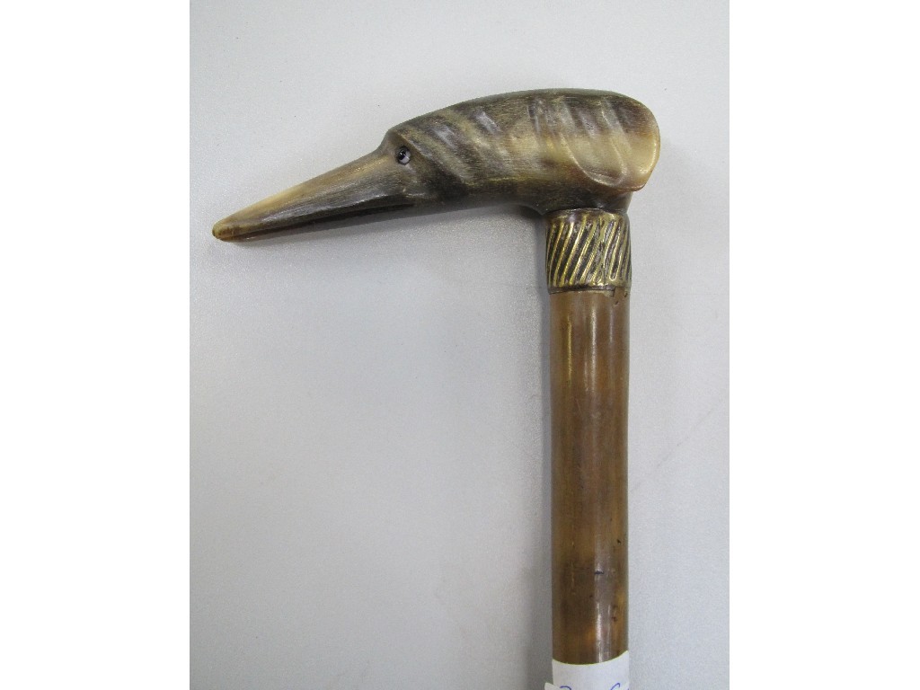 Appraisal: Walking stick with bone handle modelled as a bird's head