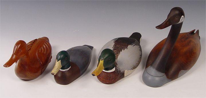 Appraisal: PIECE COLLECTION DECORATIVE DUCK GOOSE DECOYS To include Canadian goose