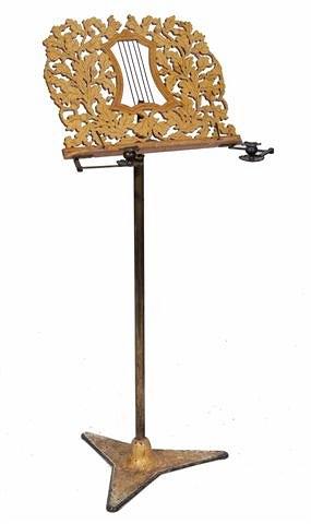 Appraisal: A REGENCY PAINTED WOOD AND TOLEWARE MUSIC STAND with fretwork