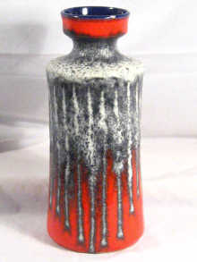 Appraisal: A tall waisted cylinder ceramic vase in red and grey