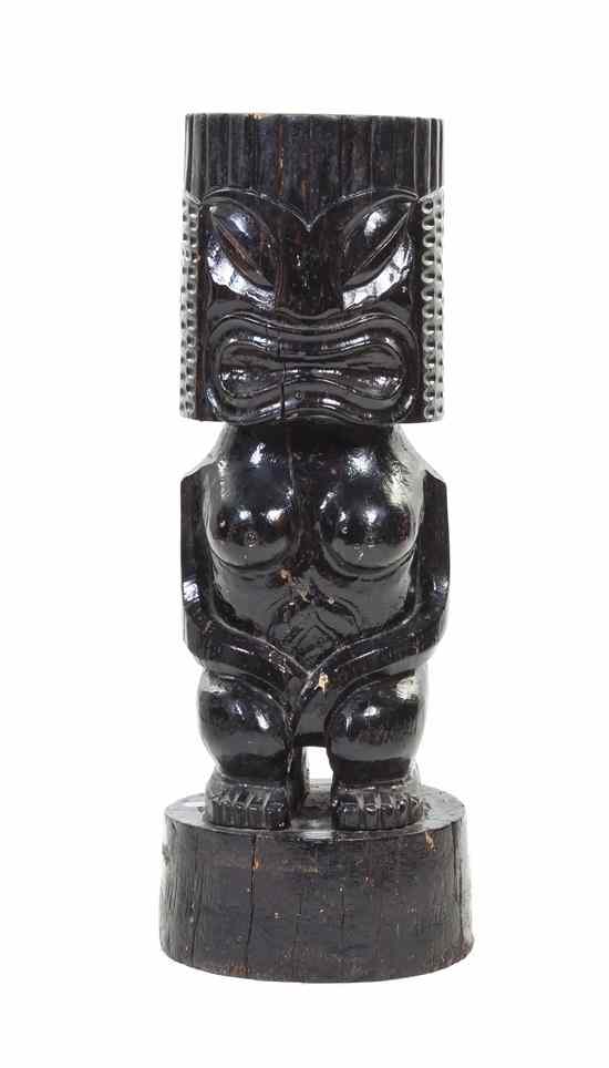 Appraisal: A Carved Wood Tiki Jardiniere depicting a female with a