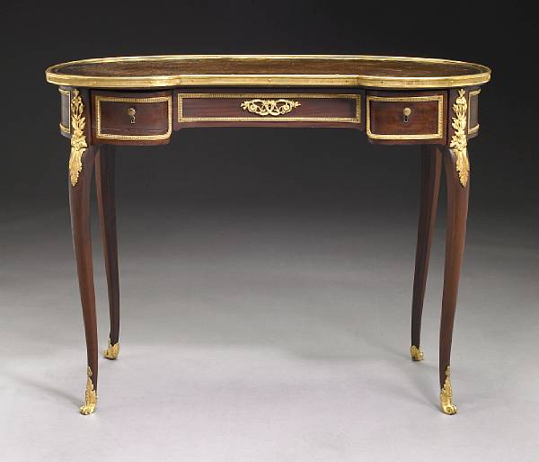 Appraisal: A Louis XV style gilt bronze mounted mahogany writing table