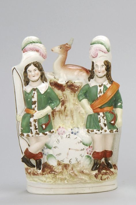 Appraisal: STAFFORDSHIRE POLYCHROME FIGURAL CLOCK GROUP Circa Of two hunters with