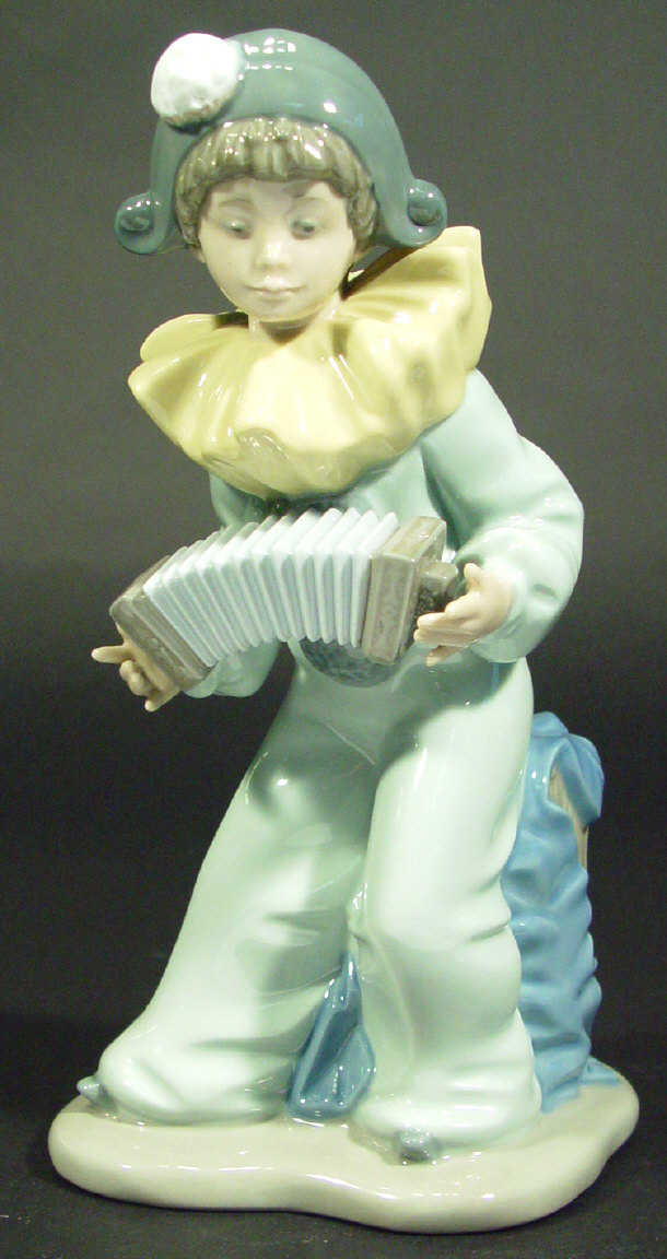 Appraisal: Nao porcelain figure of clown with an accordion printed factory