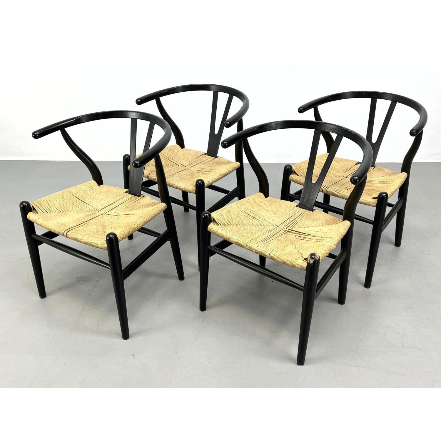 Appraisal: pc Hans Wegner style Wishbone Dining Chairs Ebonized Frames with