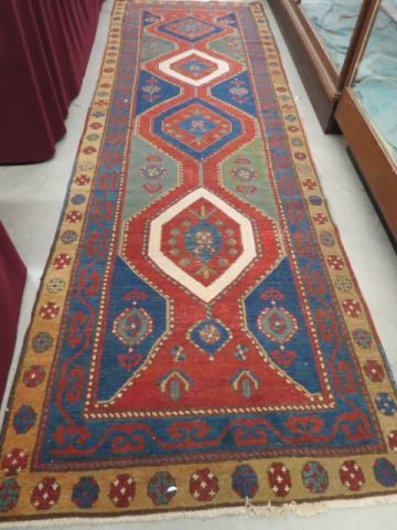 Appraisal: Heriz Persian Handmade Runner four geometric designs in center geometric