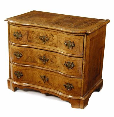 Appraisal: An th century South German walnut serpentine commode the crossbanded