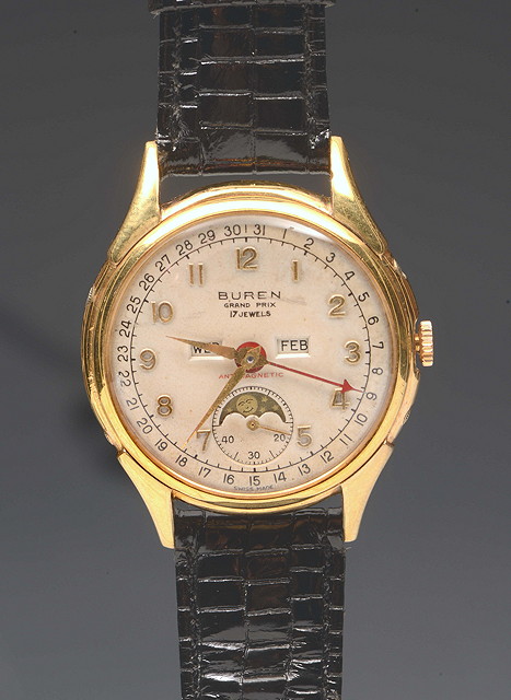 Appraisal: A SWISS BUREN GRAND PRIX WRIST WATCH with date and