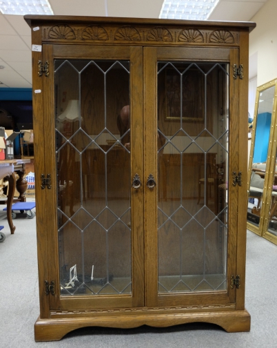 Appraisal: Modern quality leaded glass fronted door bookcase