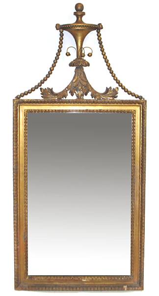 Appraisal: A Regency style carved giltwood wall mirror height in width