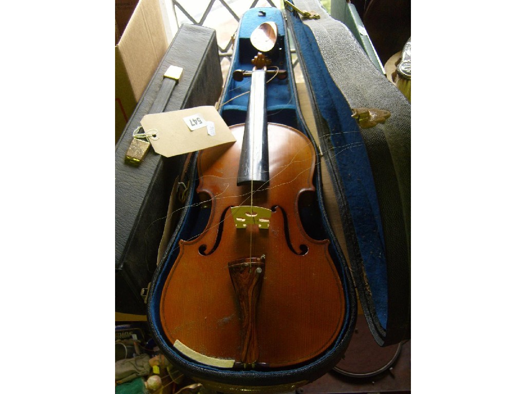 Appraisal: A cased Chinese made violin together with bow and a