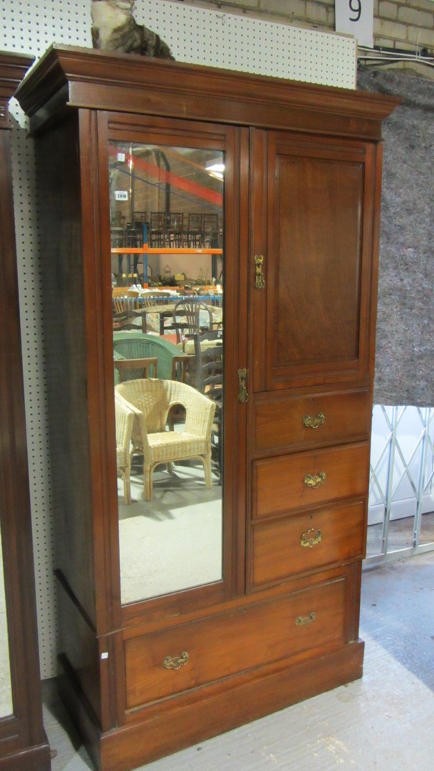 Appraisal: An early th century walnut wardrobe with mirrored door