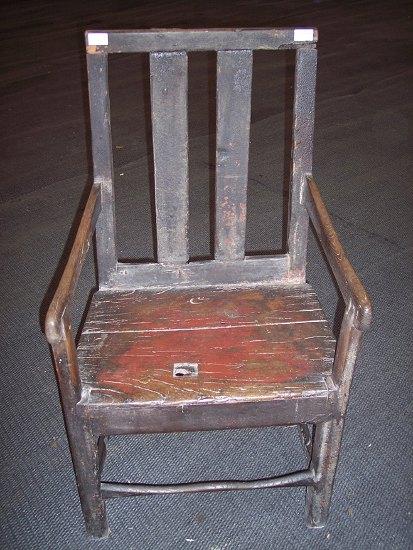 Appraisal: An th Century oak chair of rustic construction the back