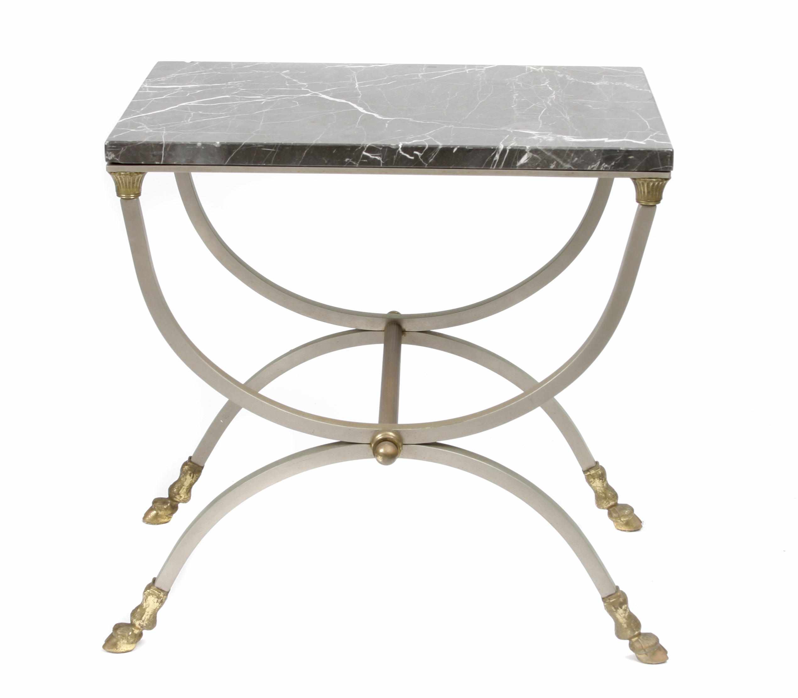 Appraisal: A marble steel and bronze side table attributed to Maison