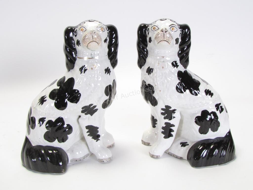 Appraisal: Pair of Staffordshire Porcelain Dogs both with unique free front