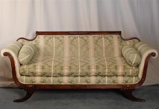 Appraisal: A Duncan Phyfe-style Settee with a mahogany frame having a