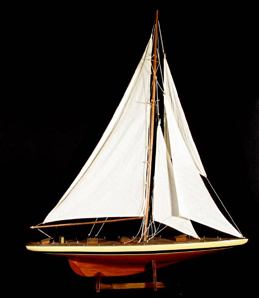 Appraisal: A large paint decorated wood model of a sailing boat