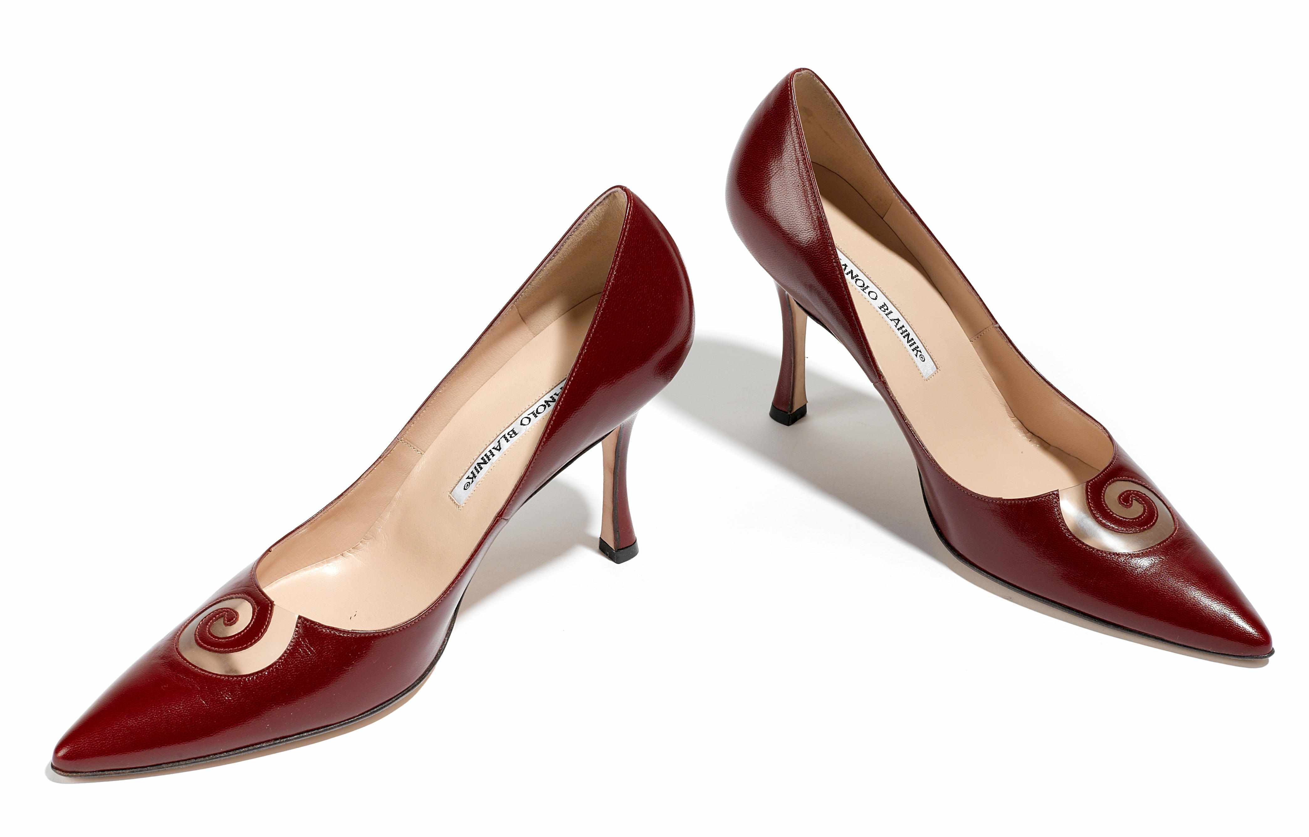 Appraisal: A pair of Manolo Blahnik red leather stilettos size