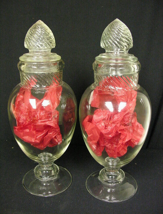 Appraisal: TWO COUNTRY STORE FOOTED CANDY JARS Size with diameter Condition