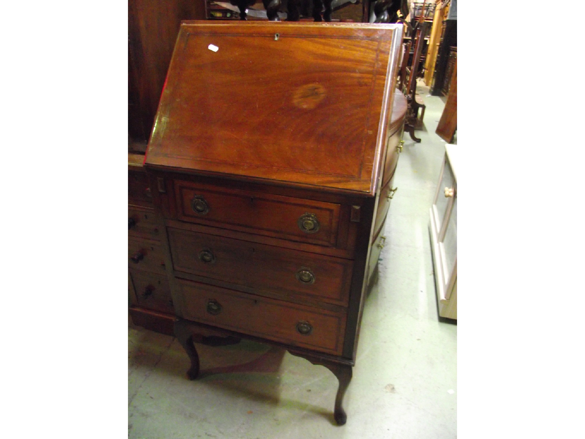 Appraisal: An inlaid Edwardian mahogany ladies writing bureau with crossbanded detail