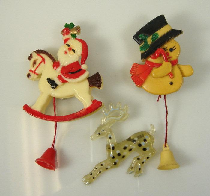 Appraisal: pcs articulated plastic costume jewelry Santa on rocking horse and