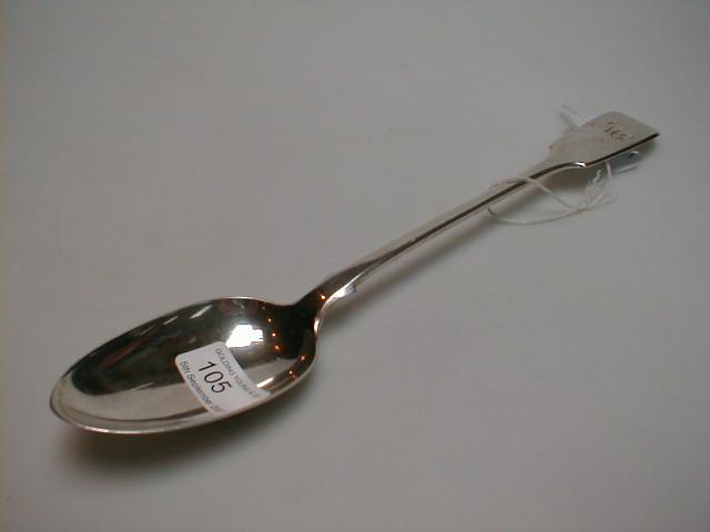 Appraisal: A Victorian silver fiddle pattern gravy spoon by William Eaton