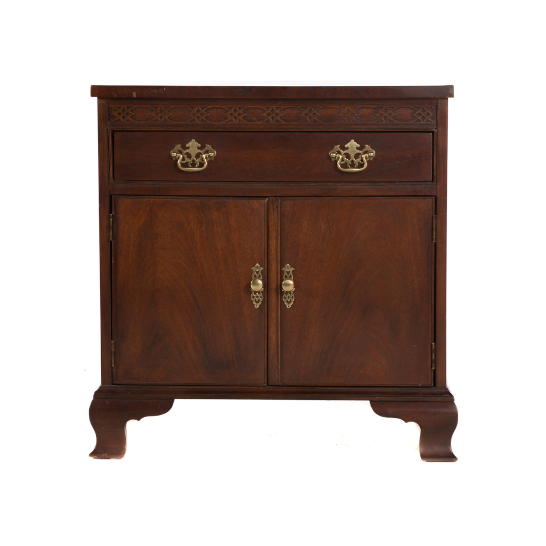 Appraisal: Baker Chippendale style mahogany side cabinet th century flat top